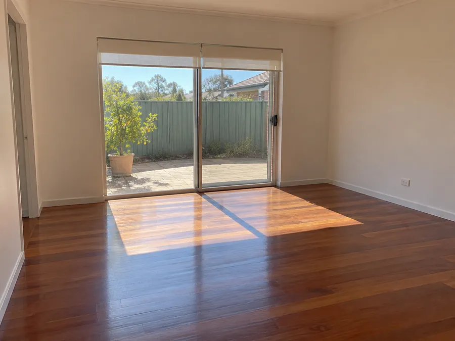Freshly cleaned empty Perth rental living room after a bond clean