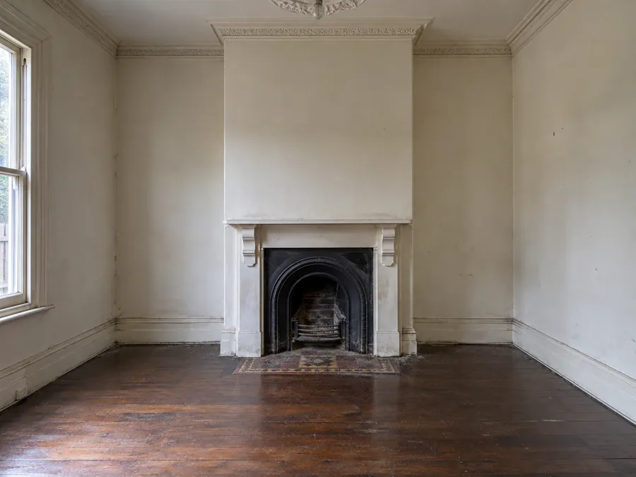 Dusty period fireplace before an end of lease clean in Melbourne