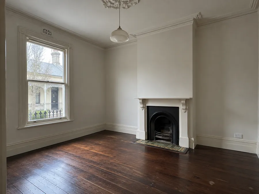 Freshly cleaned empty Melbourne terrace living room after an end of lease clean