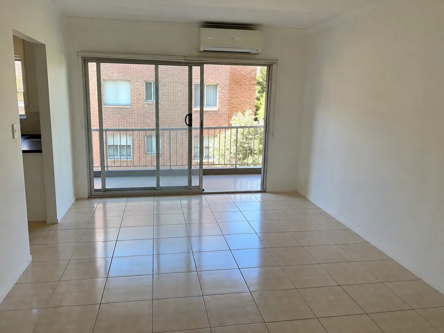 Freshly cleaned empty Sydney apartment living room after an end of lease clean