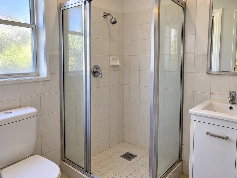 Clear shower screen after a professional end of lease clean in Sydney